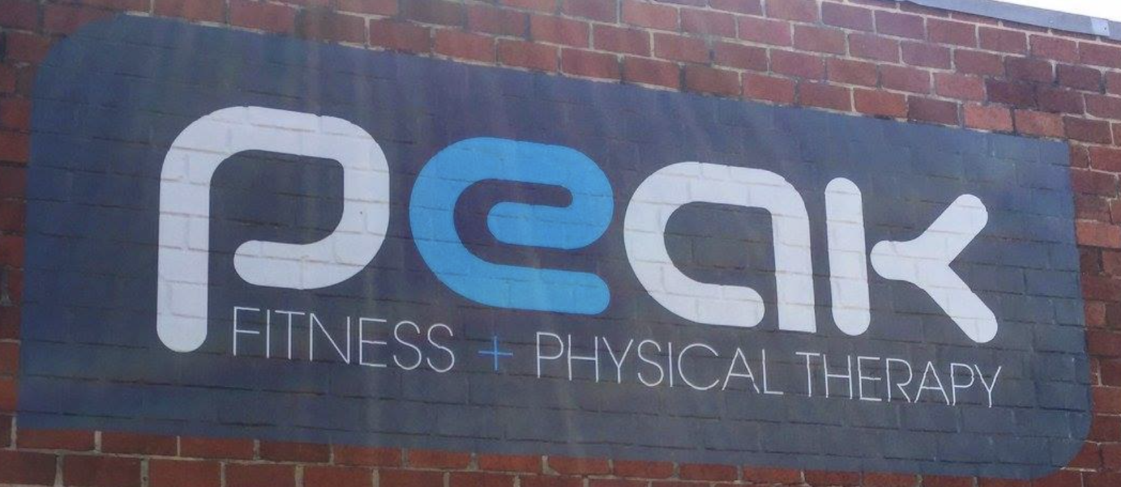 peak fitness logo sign